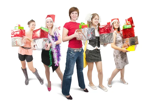 Дівчата тримають кольорові різдвяні подарунки над білим — стокове фото