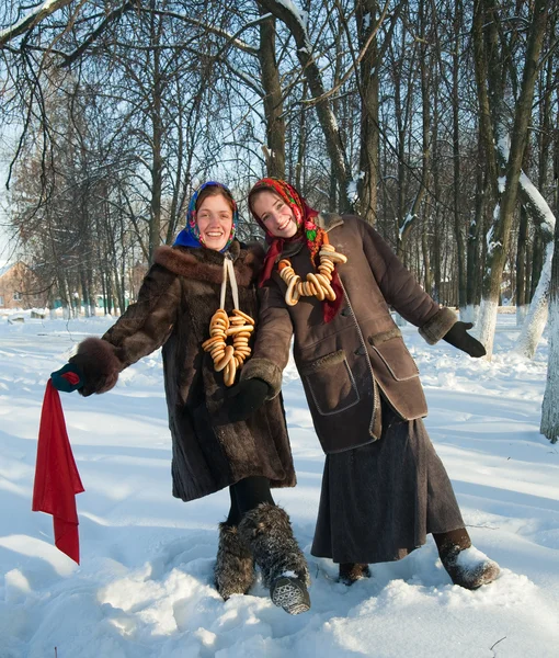 Two russian girls plays in winter — Stock Photo, Image