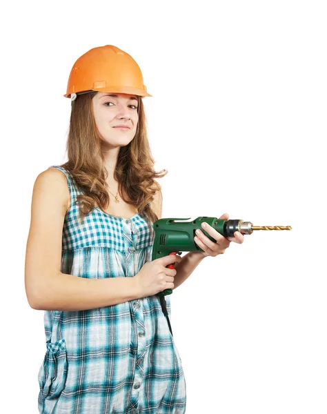 Női munkavállaló, aki egy kemény kalap fúró — Stock Fotó