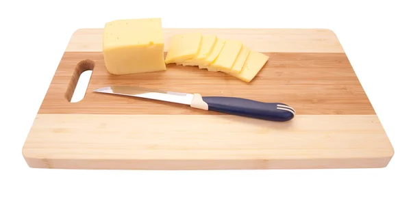 stock image Cheese on an cutting board