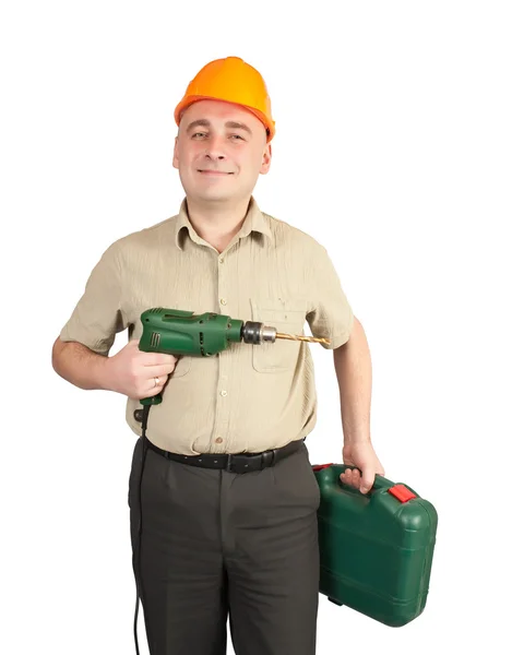 Man in hard hat with drill — Stock Photo, Image