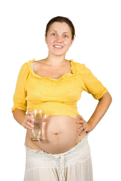 Mulher grávida com copo de água, — Fotografia de Stock