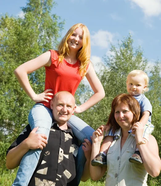 Happy family of four — Stock Photo, Image