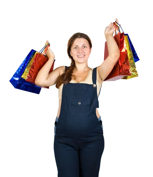 Mulher grávida com sacos de compras — Fotografia de Stock