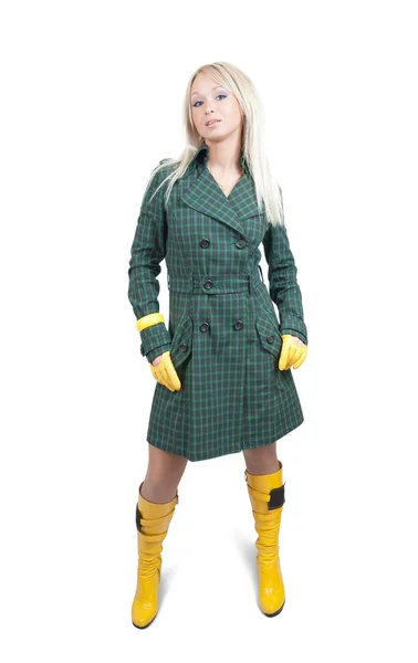 Menina de casaco verde sobre branco — Fotografia de Stock