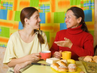 Girl and women drinking tea clipart