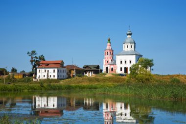 Church and river at Suzdal clipart