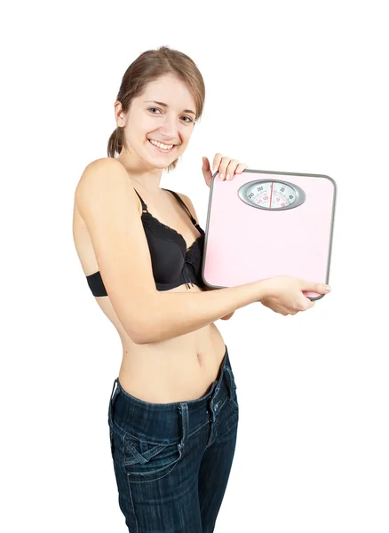 Girl holding bathroom scales — Stock Photo, Image