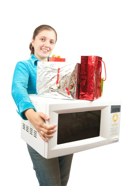 Meisje met mini oven en presenteert over Wit — Stockfoto