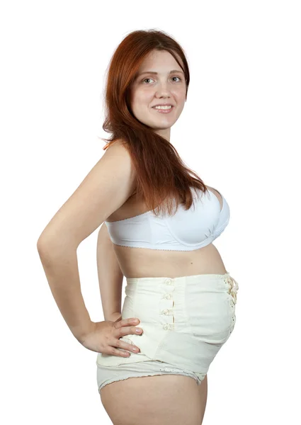 Gravid kvinna bär obstetrisk binder — Stockfoto