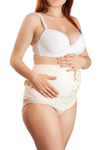 Donna incinta che indossa cintura di maternità — Foto Stock