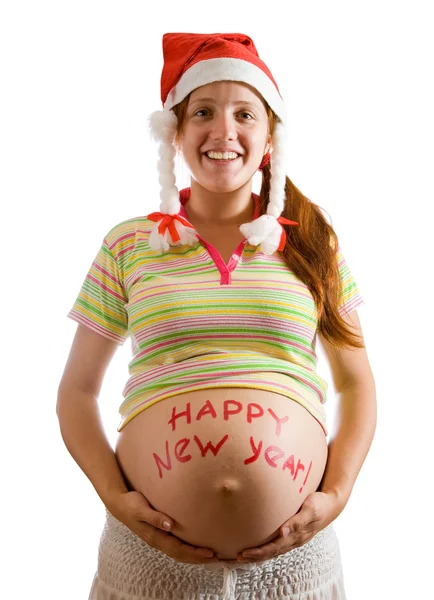 サンタ帽子と妊娠中の女性 — ストック写真