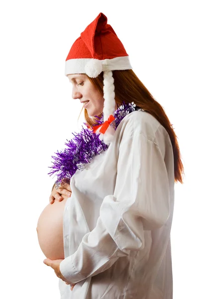 Zwangere vrouw in kerst kleding — Stockfoto