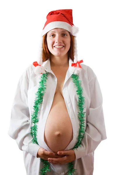Terhes nő karácsonyi kalapban — Stock Fotó