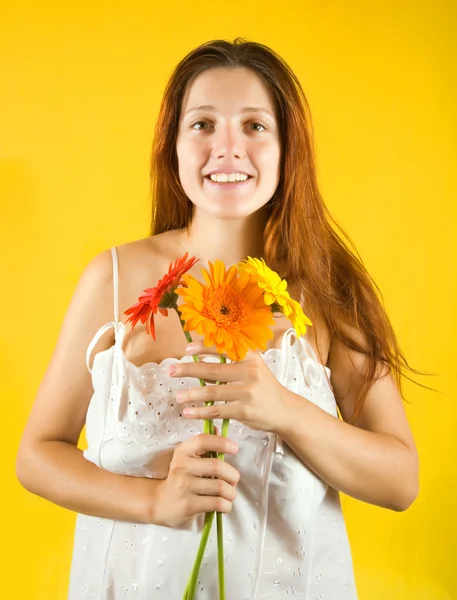Pretty girl with flowers — Stock Photo, Image