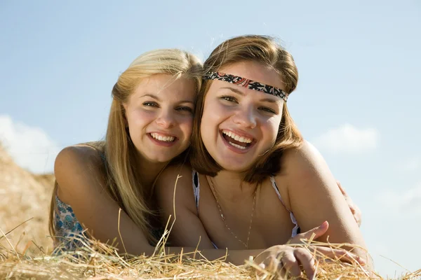 Country girls on hay — Stock Photo, Image