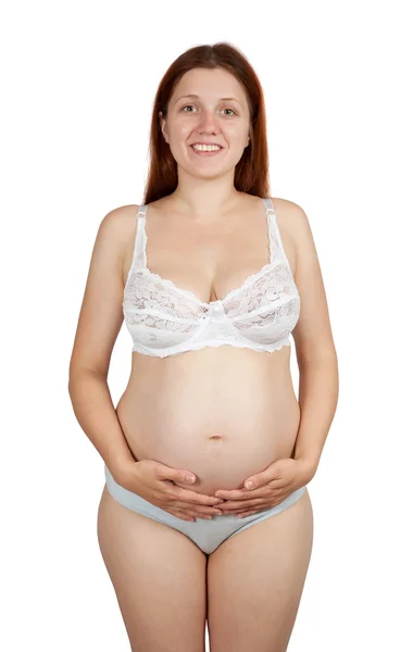 怀孕的女人抱着肚子 — 图库照片