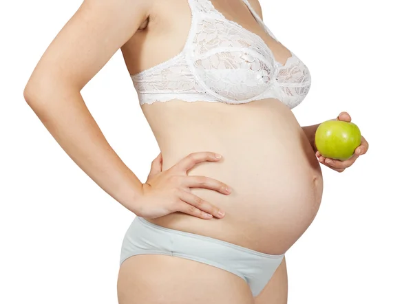 Terhes nő almával — Stock Fotó