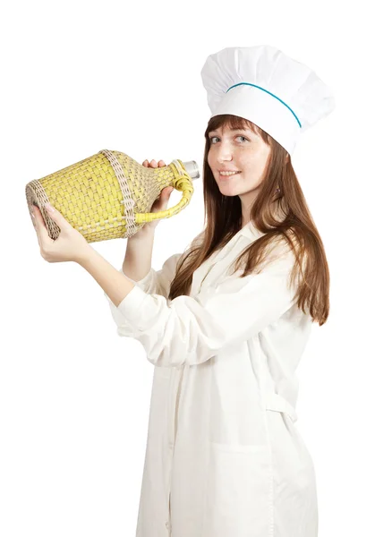 Kadın aşçı holding büyük şişe — Stok fotoğraf