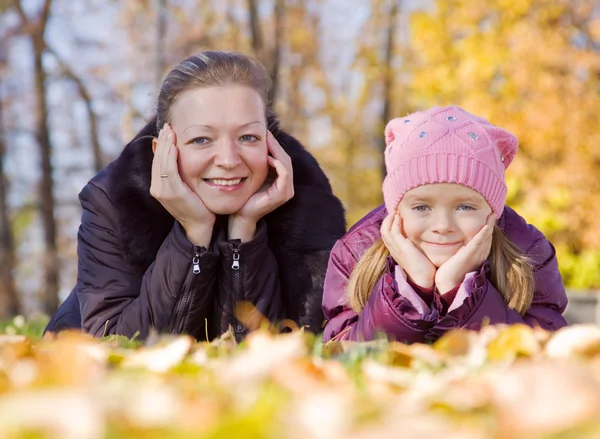 Mother with her girl in autumn — Stock Photo, Image