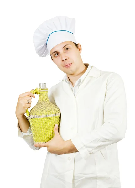 Cozinheiro segurando garrafa grande — Fotografia de Stock