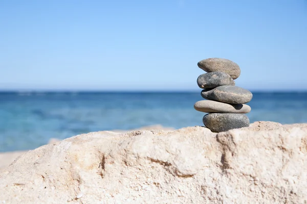 stock image Balanced stones on a beach