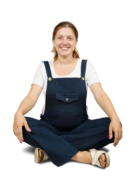 Pregnant girl doing yoga — Stock Photo, Image