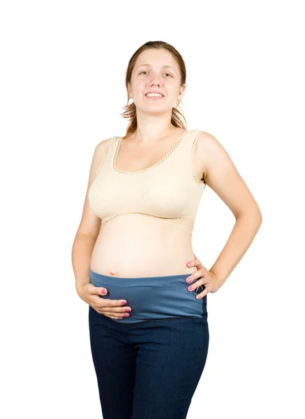 Terhes lány hasára gazdaság — Stock Fotó