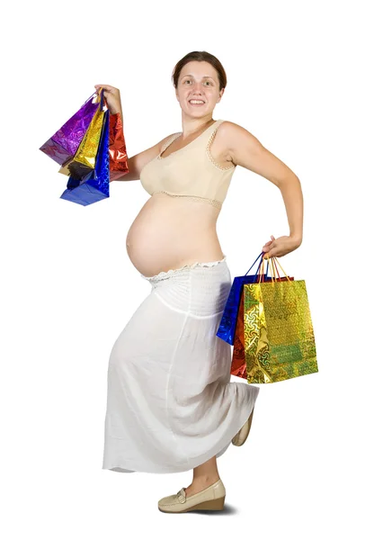 Έγκυος που κρατάει τσάντες για ψώνια. — Φωτογραφία Αρχείου