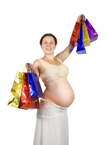 Έγκυος γυναίκα με σακούλες για ψώνια — Φωτογραφία Αρχείου