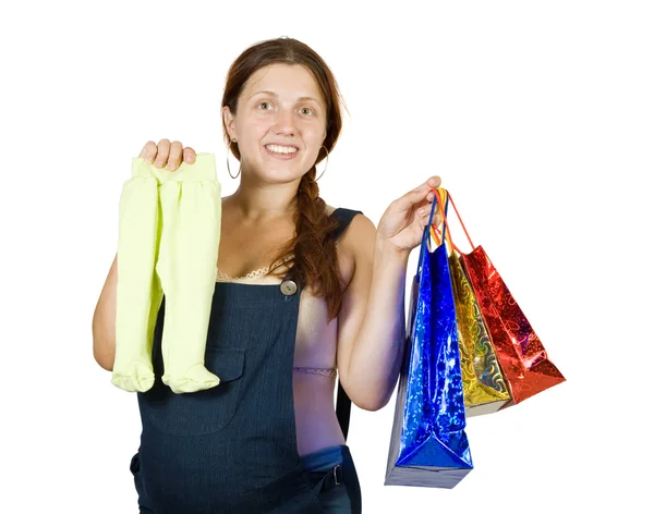Hamile kadın ile alışveriş torbaları — Stok fotoğraf