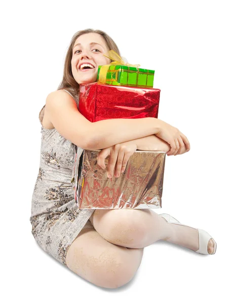 Dívka s několika barevnými dárky — Stock fotografie