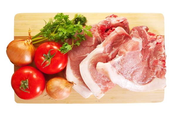 Сырая свинина и овощи — стоковое фото