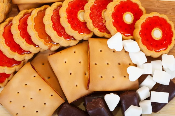 stock image Various cookies and chocolate candy with sugar