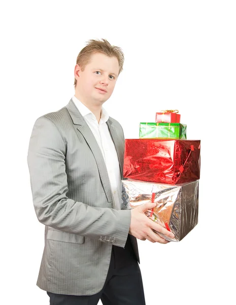 Empresário com caixas de presente — Fotografia de Stock