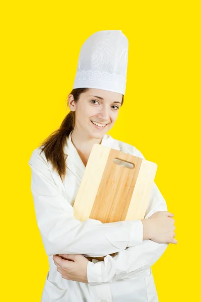 Young Girl Chef Uniform Holding Cutting Board Yellow Background — Stock Photo, Image