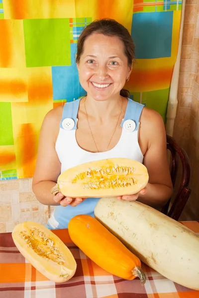 Mature woman with vegetable marrow — Stock Photo, Image
