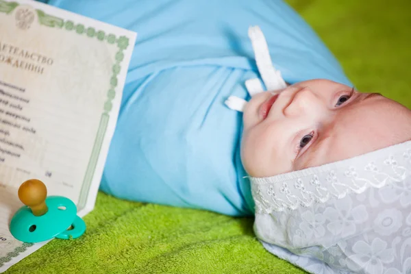 stock image Baby with certificate of birth