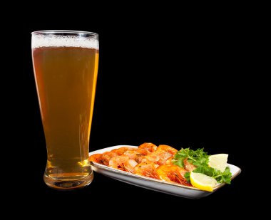 Beer and fried shrimps on black background clipart