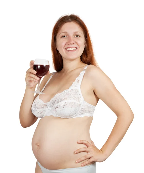 ワインのグラスと妊娠中の女性 — ストック写真