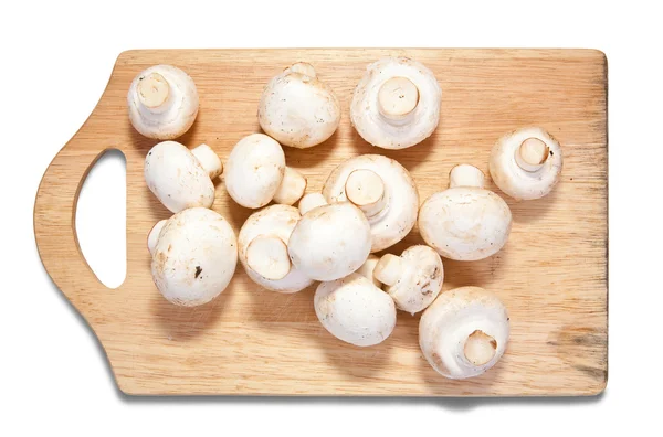 Культивируемые грибы на доске — стоковое фото