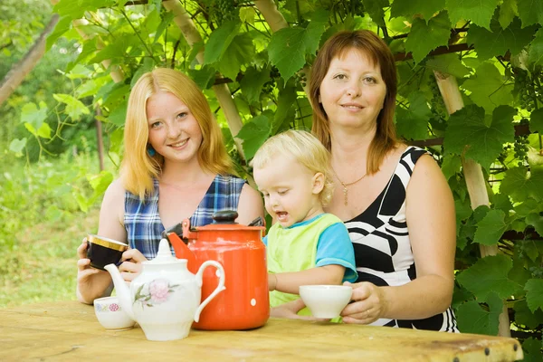 Family having tea — Stock Photo, Image