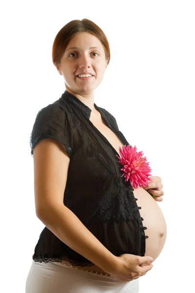 怀孕的女人与花 — 图库照片