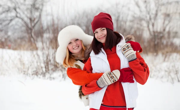 Miling girls in winter — Stock Photo, Image