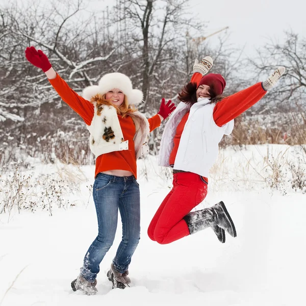 Two Happy Girls Jumping Winter Park — Stock Photo, Image