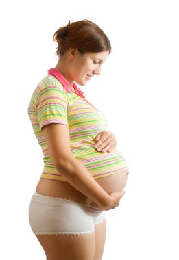 Portrait of pregnant woman looking belly over white clipart