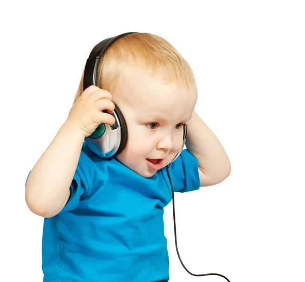 Kleiner Junge Hört Musik Mit Friedlichem Gesichtsausdruck — Stockfoto