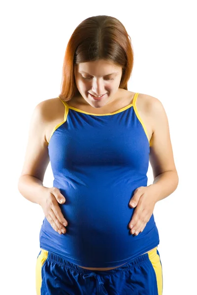 快乐孕妇举行她的肚子的肖像 — 图库照片