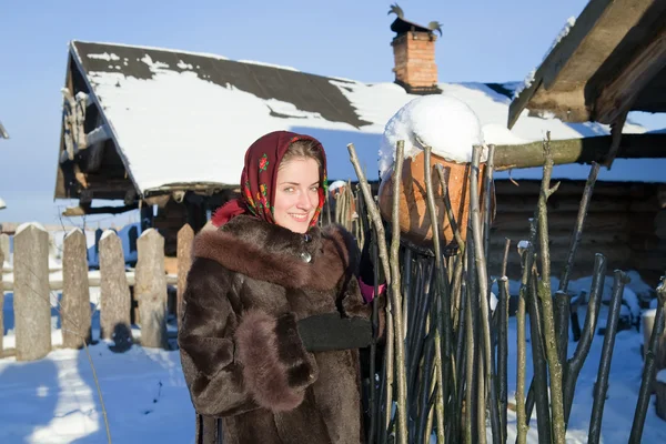 Girl in fur coat — Stock Photo, Image