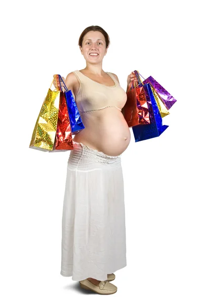 Gravid kvinna som håller i kassar — Stockfoto